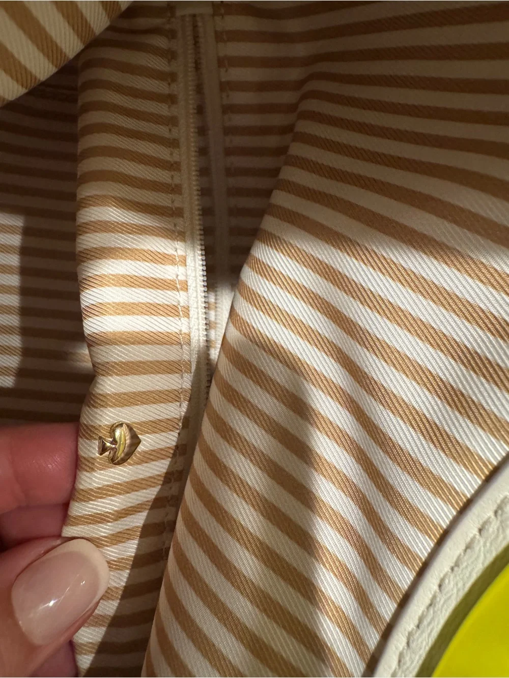 kate spade Cream Leather Tote with Yellow Circular Handle Accent